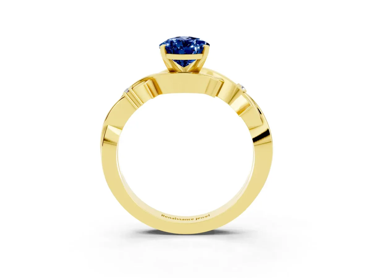 Pear Cut Blue Sapphire Solitaire Ring with Twisted Band and Prong Setting Yellow gold