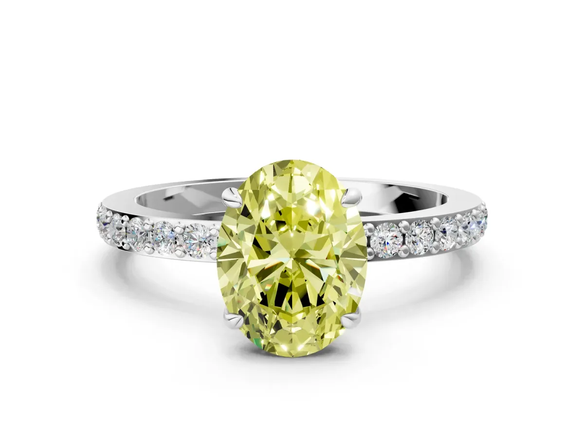 Fancy Yellow Oval Cut Diamond Solitaire Engagement Ring with Pavé Band and Four-Prong Setting Silver