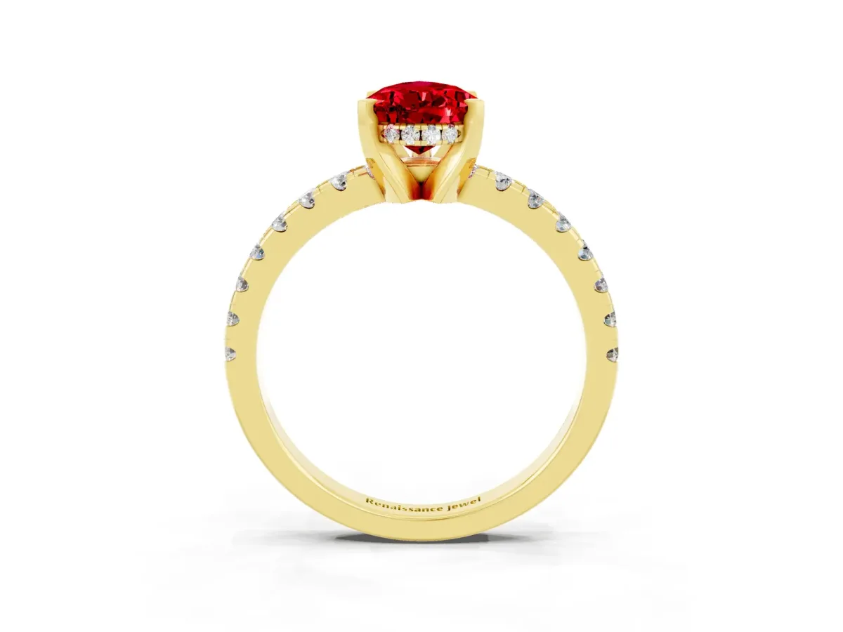 Pear Cut Ruby Solitaire Ring with Round Pavé Band and Four-Prong Setting Yellow gold