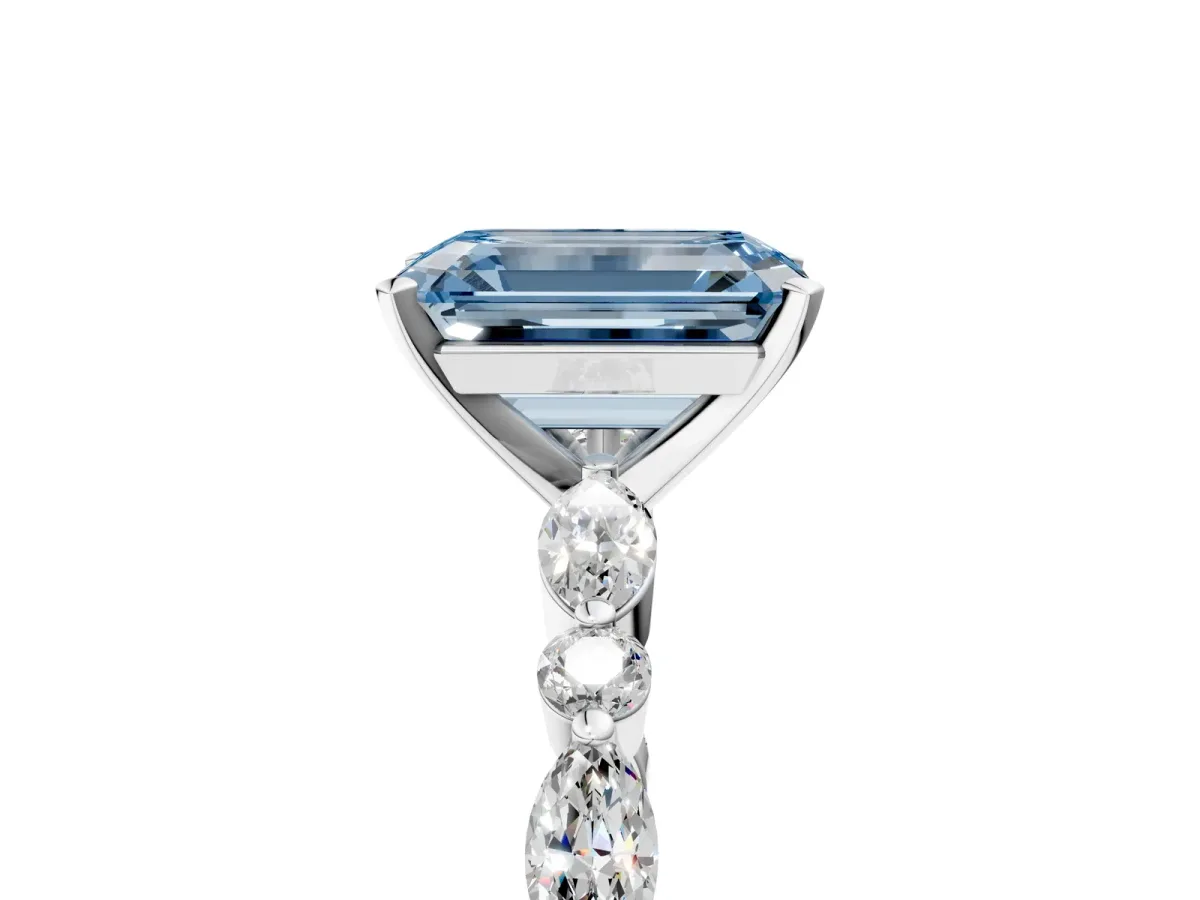 Fancy Blue Emerald Cut Diamond Ring with Marquise and Round Side Stones and Four-Prong Setting Silver