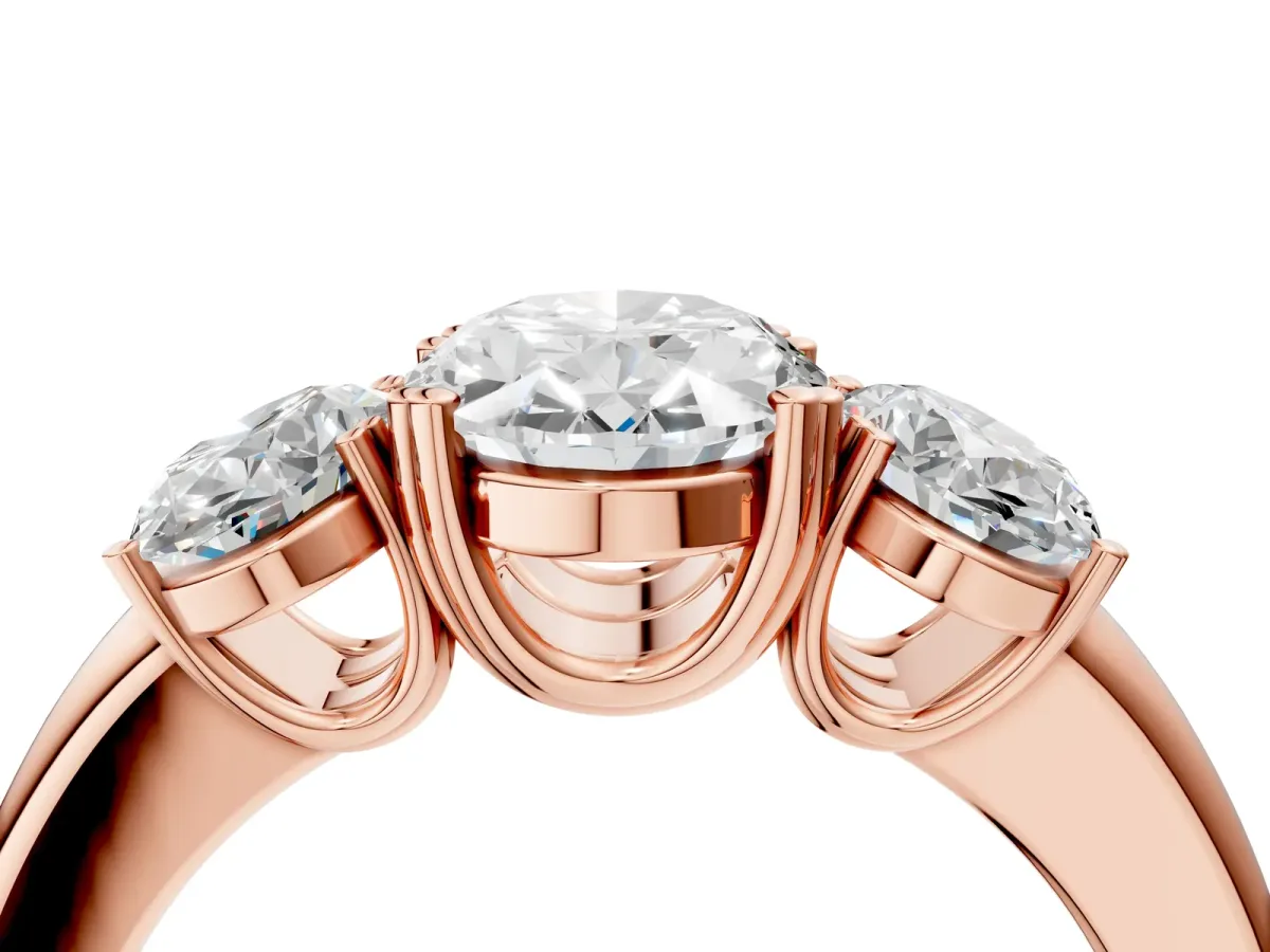 Three-Stone Oval Cut Cut Diamond Ring with Channel Set Band and Four-Prong Setting Rose gold