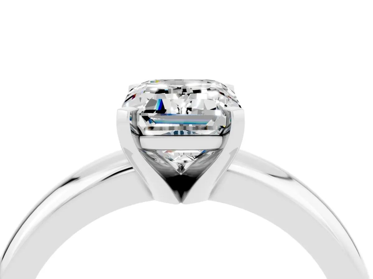 Emerald Cut Moissanite Solitaire Engagement Ring with Round Band and Four-Prong Setting Silver