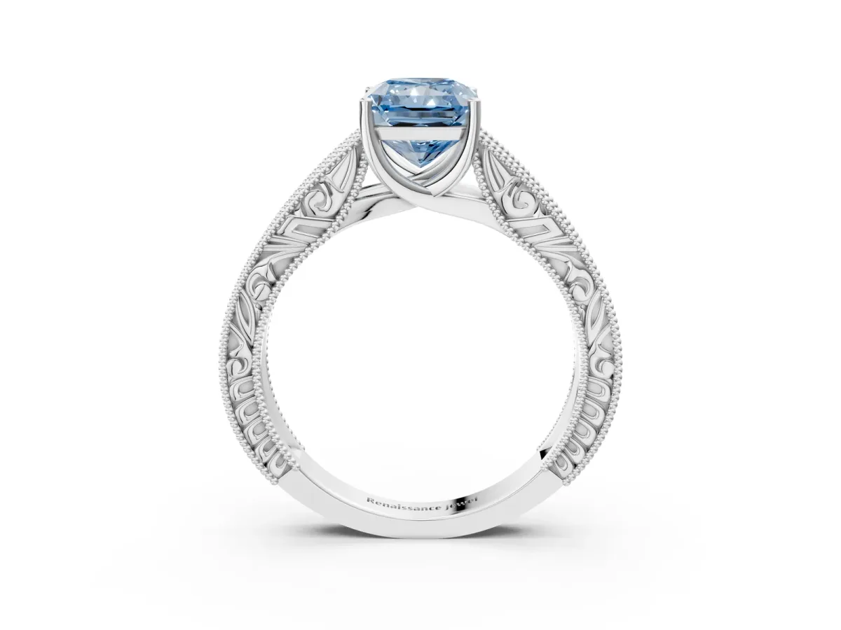 Fancy Blue Radiant Cut Diamond Solitaire Ring with Engraved Band and Four-Prong Setting Platinum