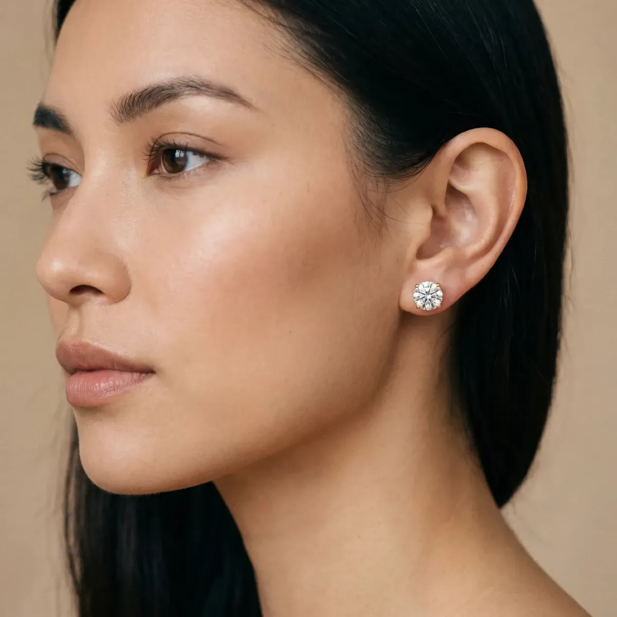 Round Solitaire Diamond Stud Earrings with Four-Prong Basket Setting Yellow gold