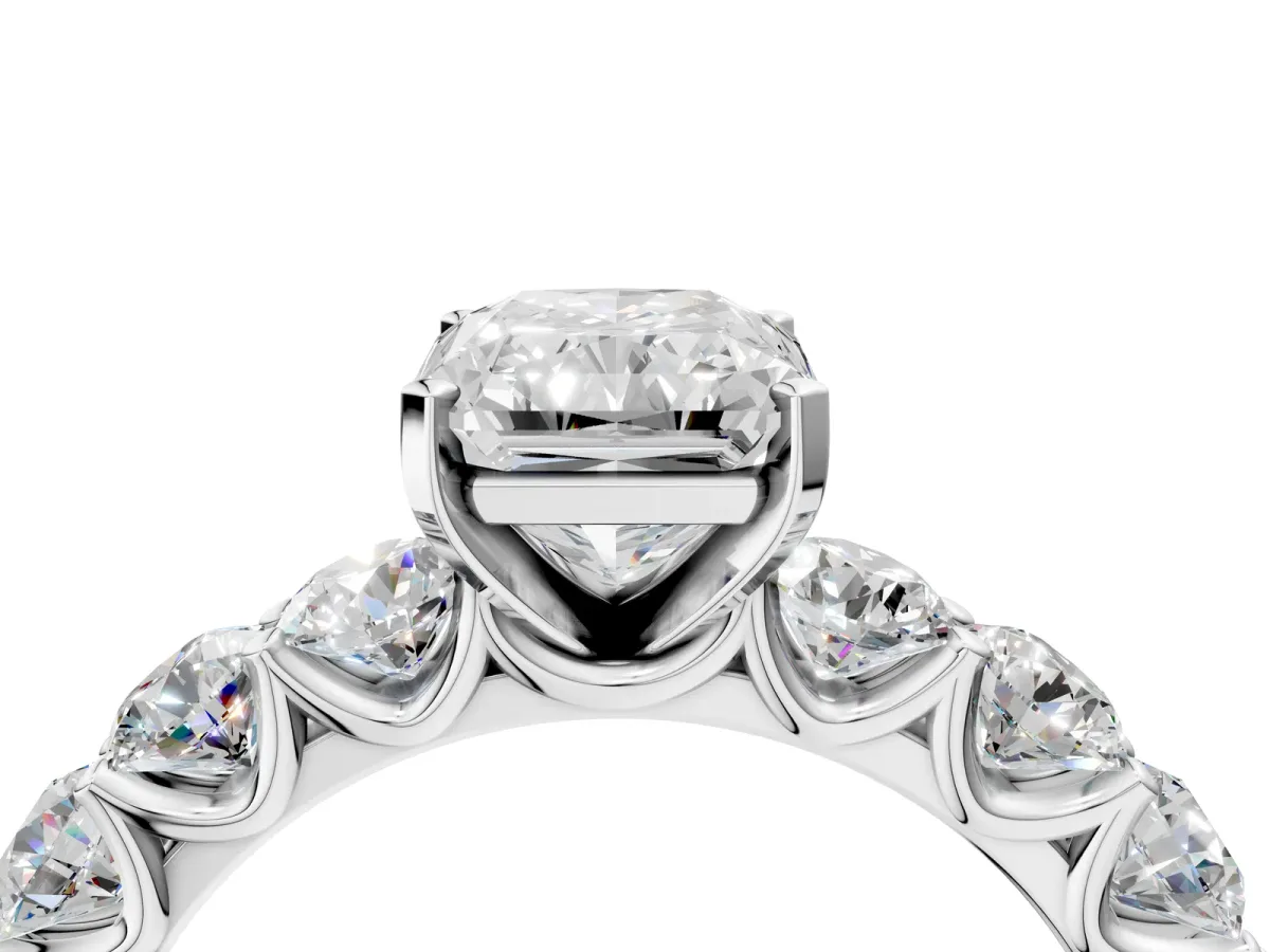 Radiant Cut Diamond Prong Setting with Side Stones on a Pave Band Silver