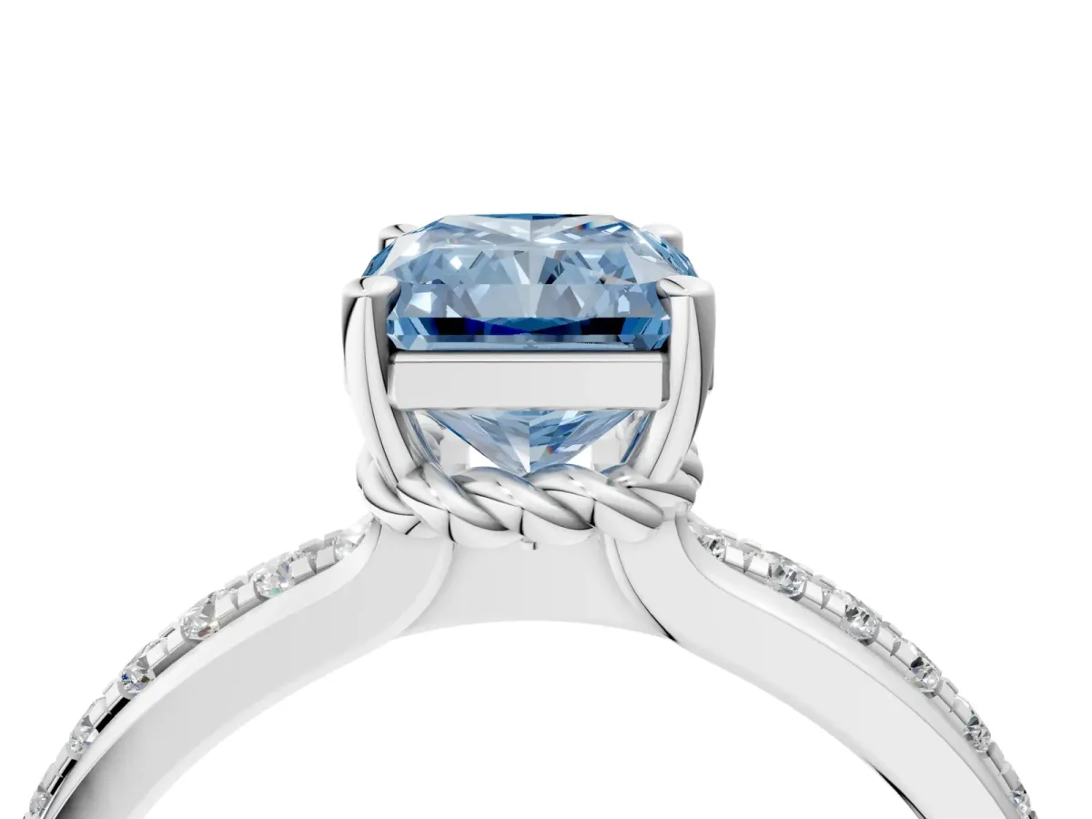 Fancy Blue Radiant Cut Solitaire Diamond Ring with Channel Set Band and Six-Prong Setting Platinum