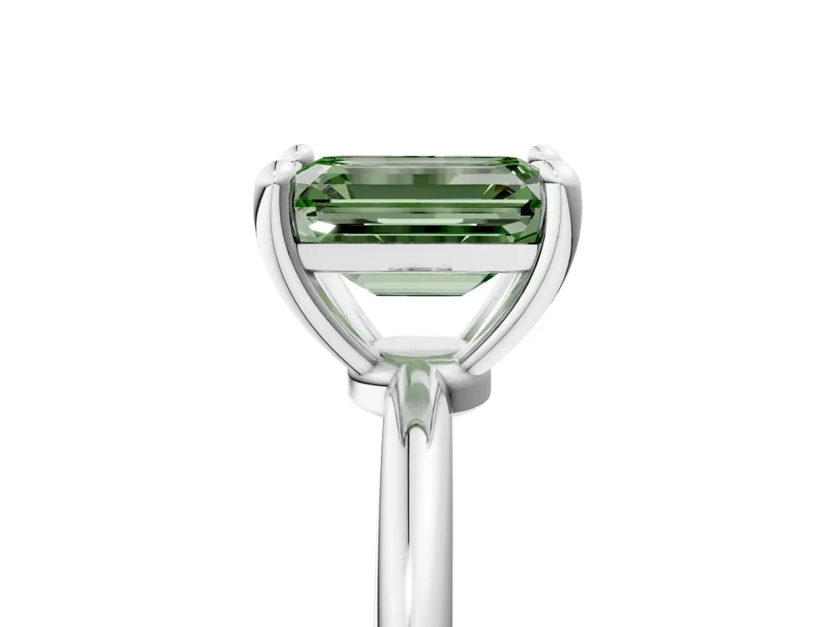 Fancy Green Emerald Cut Solitaire Diamond Ring with 4-Prong Setting on a Classic Band Silver