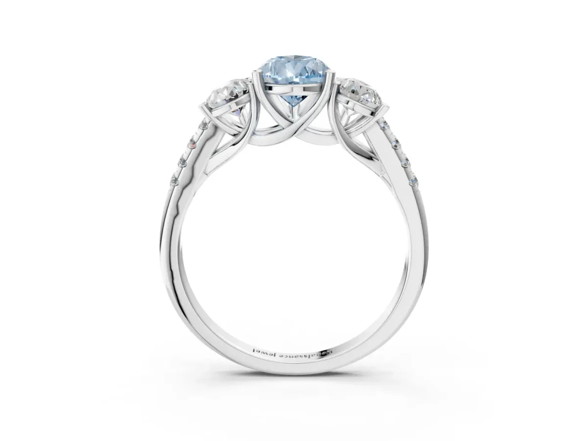 Fancy Blue Three-Stone Pear Cut Diamond Ring with Round Pavé Band and Prong Setting Platinum
