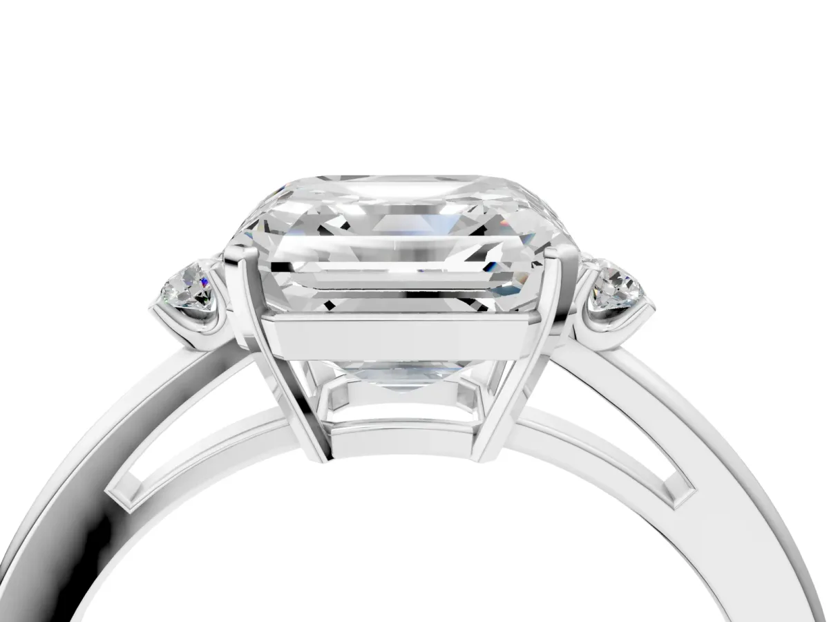 Asscher Cut Cut Three-Stone Solitaire Ring with Round Accent Diamonds and Four-Prong Setting Platinum