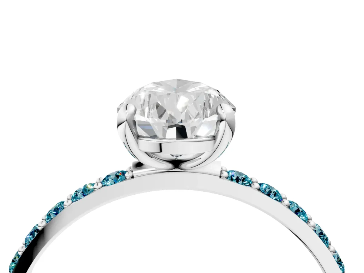 Pear Cut Diamond Solitaire Ring with Round Blue Topaz Pavé Band and Prong Setting Silver