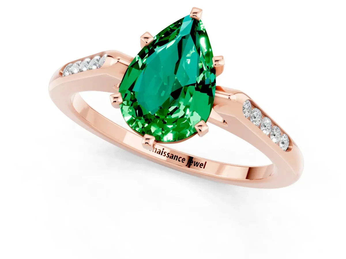 Pear Cut Emerald Solitaire Ring with Channel Set Round Band and Prong Setting Rose gold