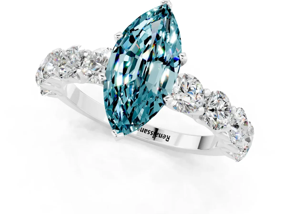 Marquise Cut Blue Topaz Prong Setting with Side Stones on a Pave Band Silver