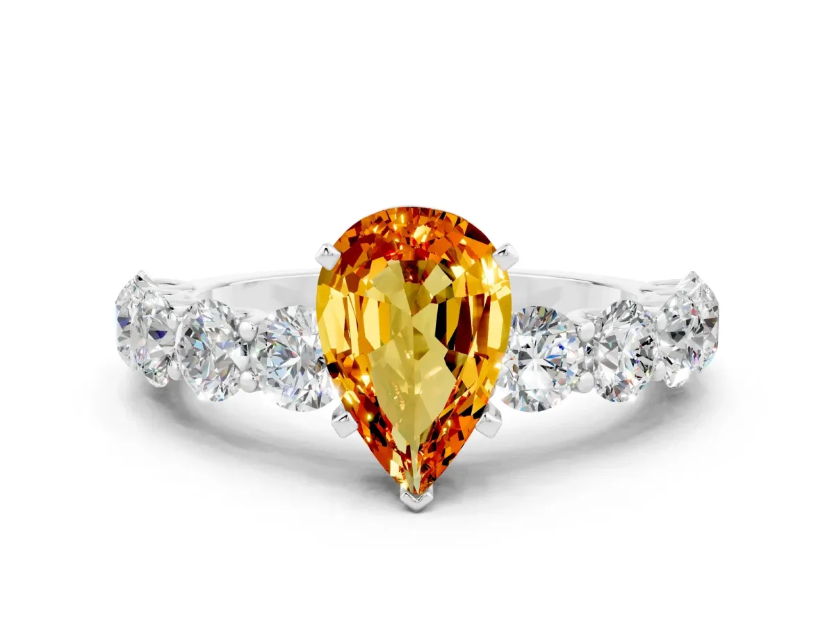 Pear Cut Citrine Prong Setting with Side Stones on a Pave Band Silver