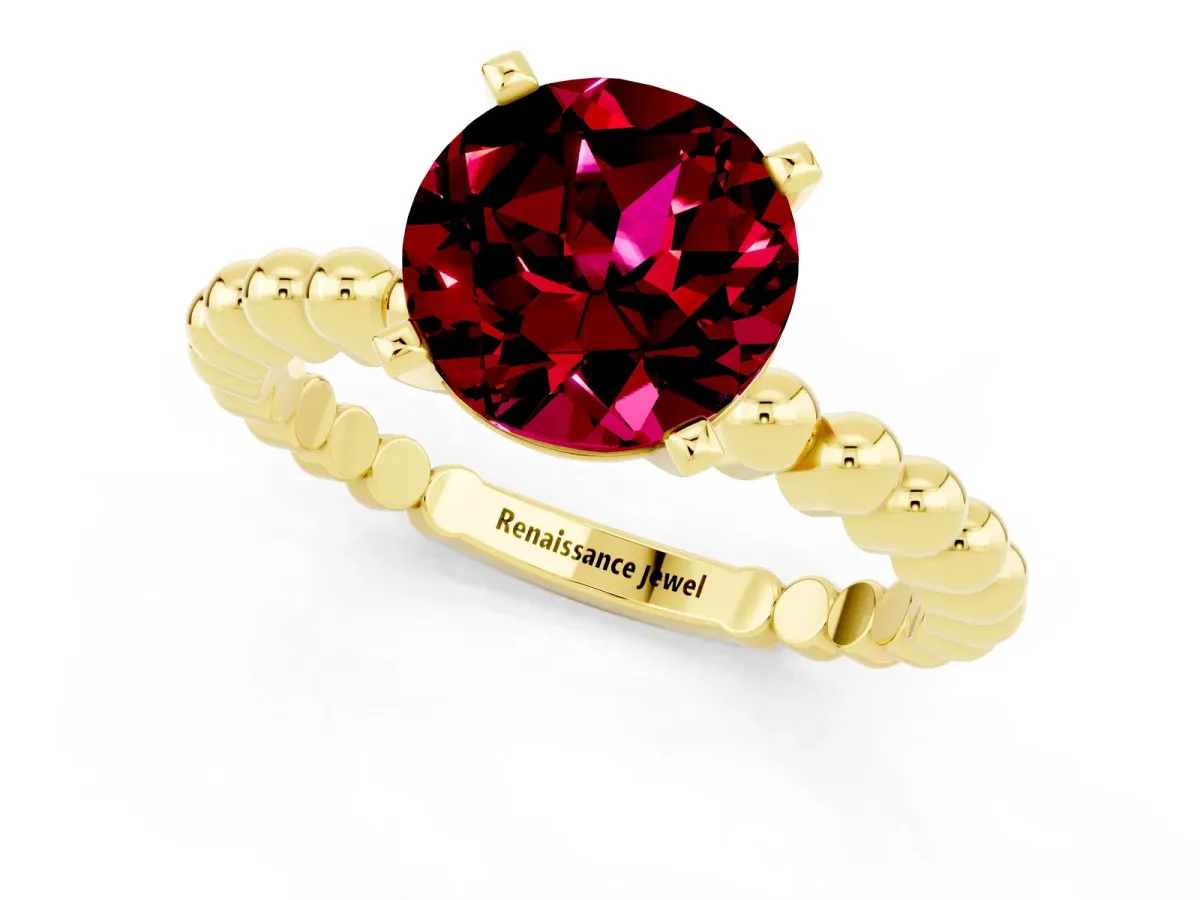 Round Cut Garnet Solitaire Ring with Beaded Band and Prong Setting Yellow gold