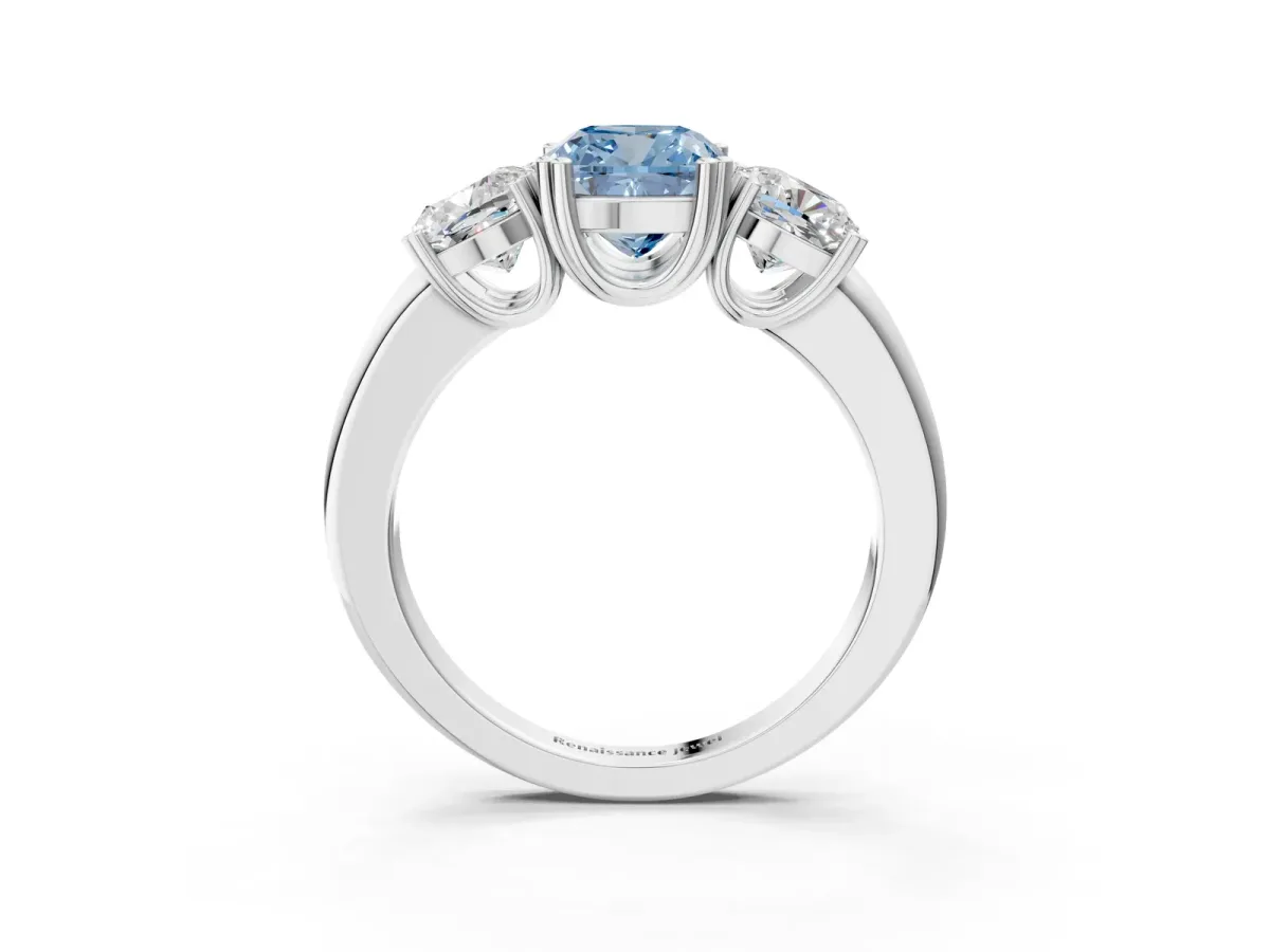 Fancy Blue Three-Stone Cushion Cut Cut Diamond Ring with Channel Set Band and Four-Prong Setting Silver