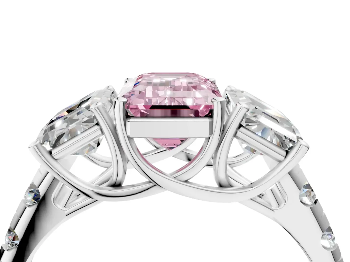 Fancy Pink Three-Stone Emerald Cut Diamond Pavé Band with Prong Setting Platinum