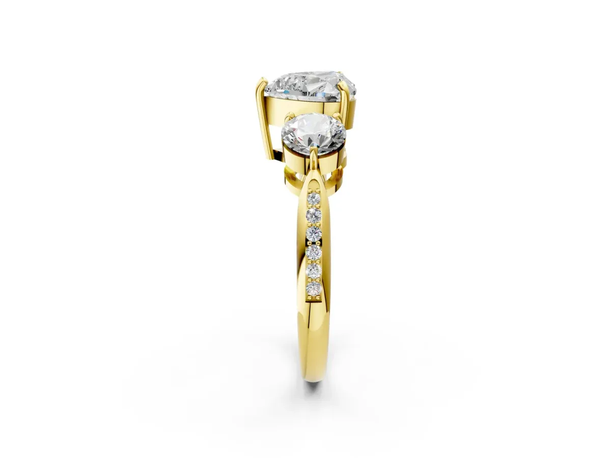 Three-Stone Heart Cut Diamond Channel Set Engagement Ring with Prong Setting Yellow gold