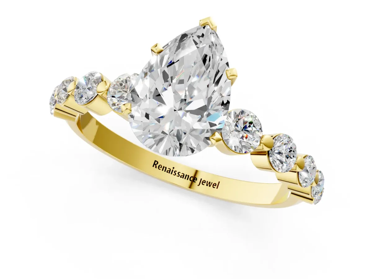 Pear Cut Solitaire Diamond Ring with Pave Band and Four-Prong Setting Yellow gold