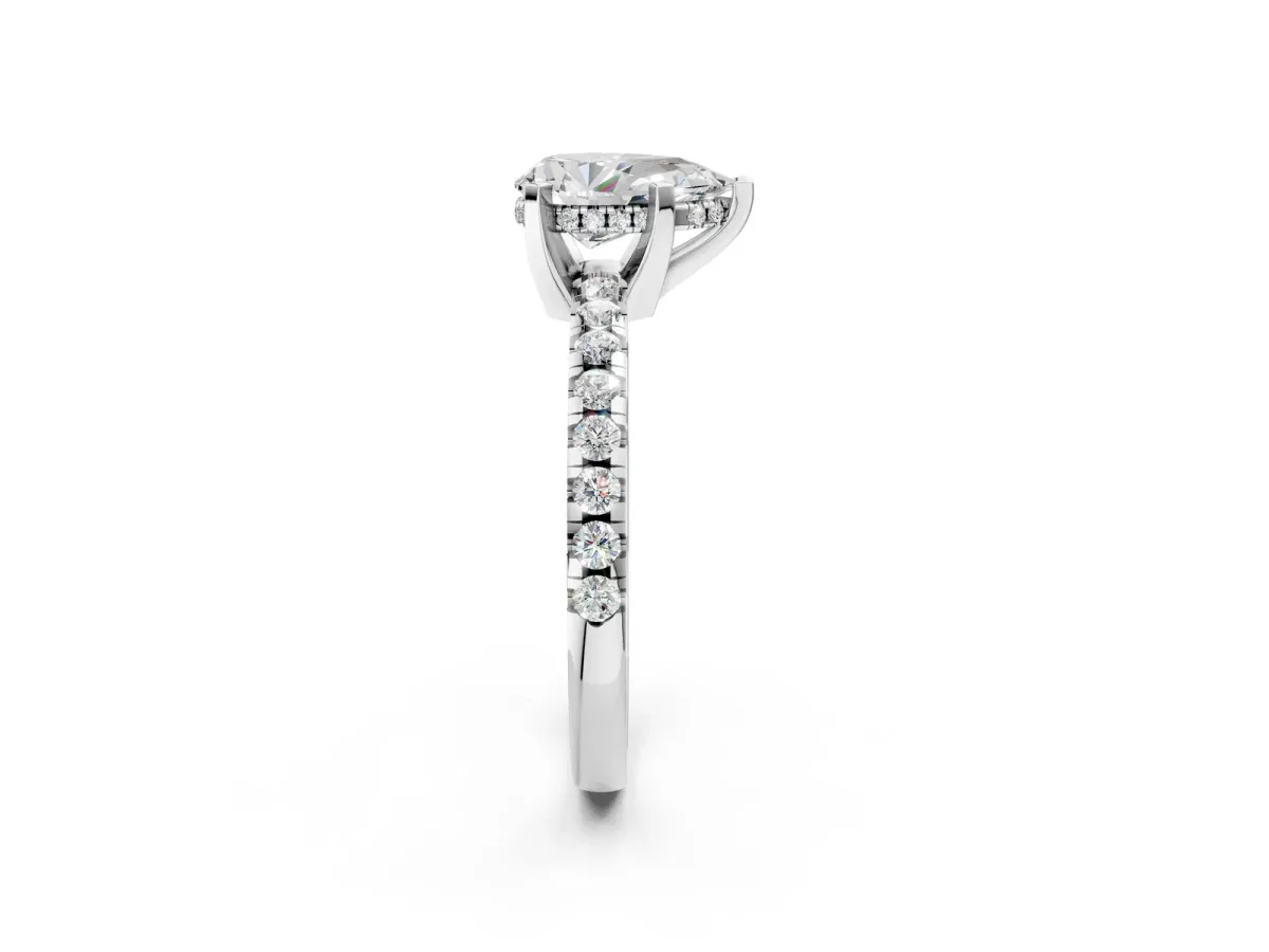 Pear Cut Diamond Solitaire Ring with Round Moissanite Pavé Band and Four-Prong Setting Silver