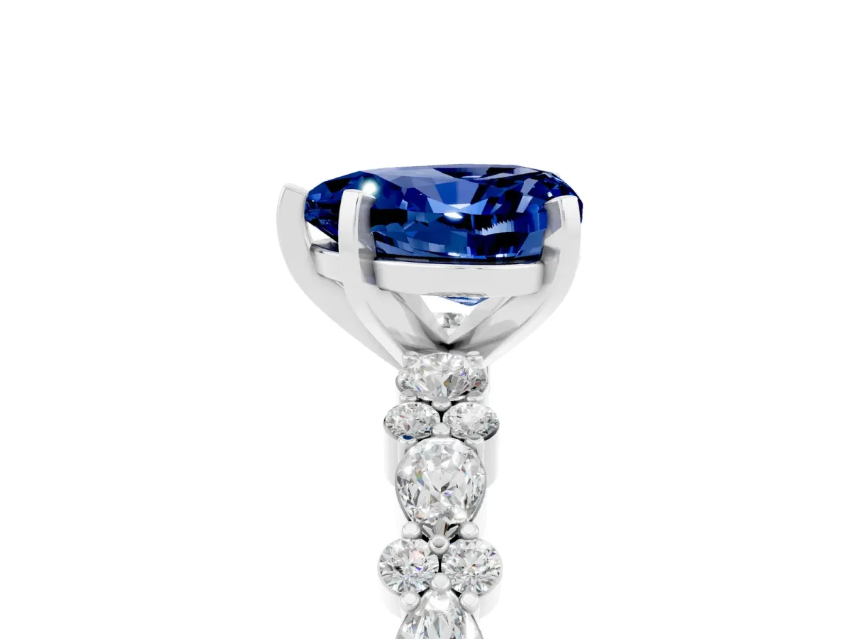 Heart Cut Blue Sapphire Side Stone Solitaire Ring with Round and Four-Prong Setting Platinum