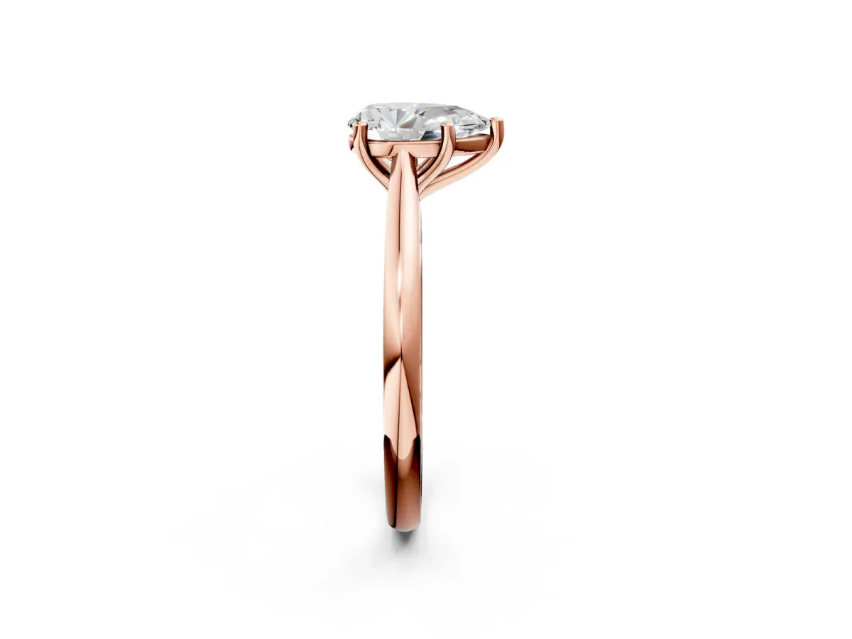 Pear Cut Cut Solitaire Ring with Cathedral Band and Four-Prong Setting Rose gold