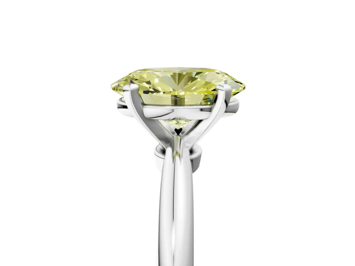 Fancy Yellow Oval Cut Diamond Solitaire Ring with Six-Prong Setting and Classic Band Platinum