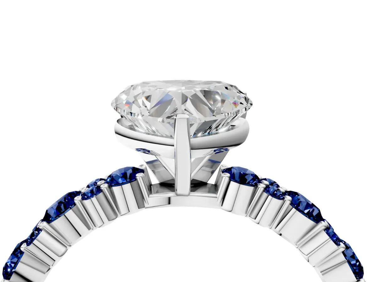 Heart Cut Diamond Side Stone Solitaire Ring with Round Blue Sapphire and Four-Prong Setting Platinum