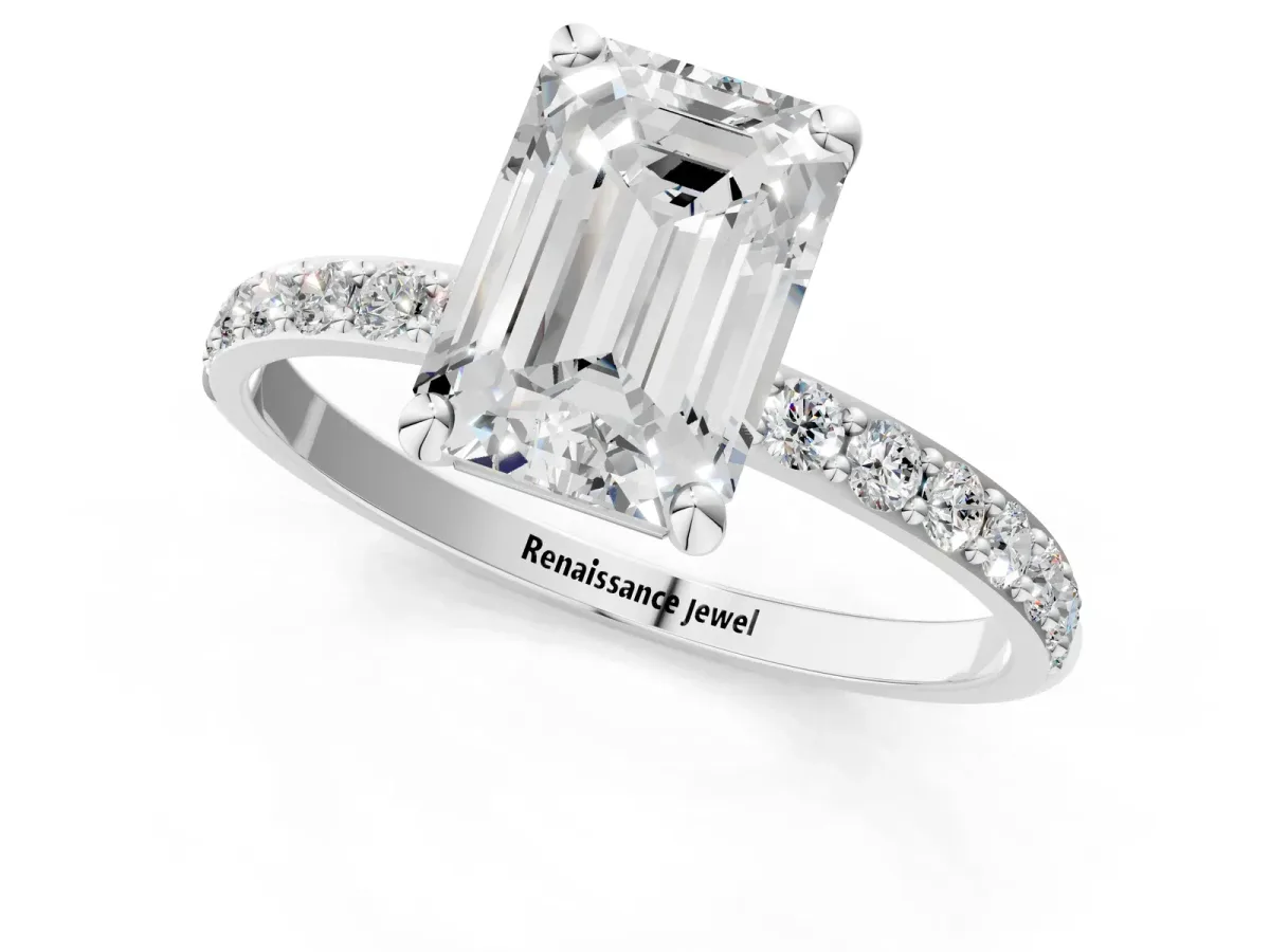Emerald Cut Diamond Solitaire Ring with Round Pavé Band and Prong Setting Silver