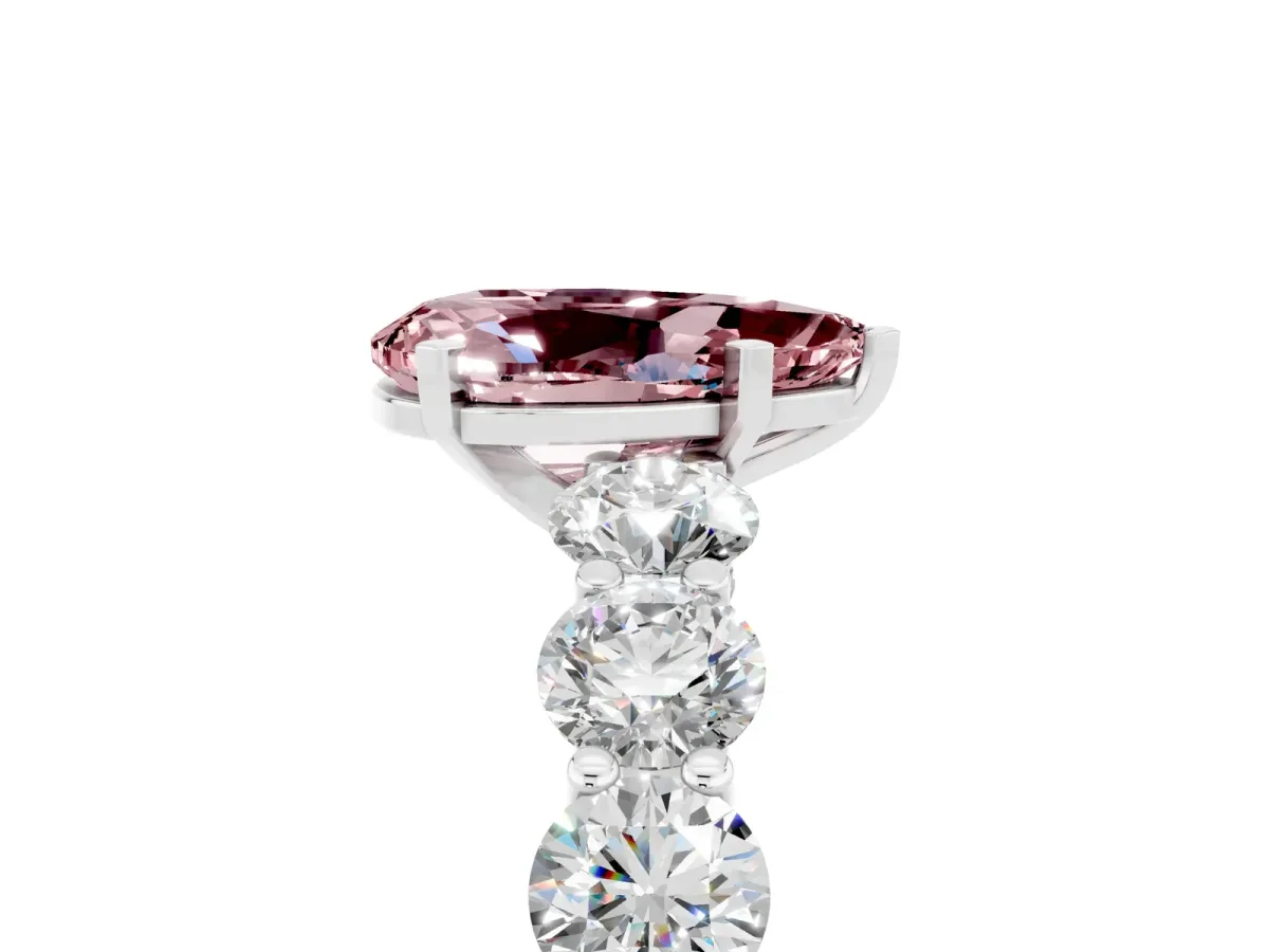 Pear Cut Morganite Prong Setting with Side Stones on a Pave Band Silver