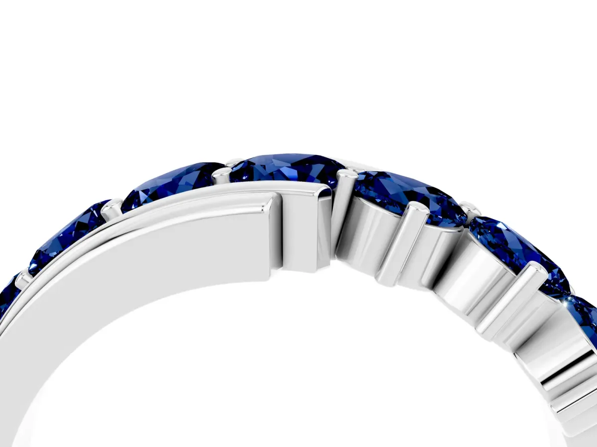 Round Blue Sapphire Wave Band with Channel and Shared Prong Setting Silver