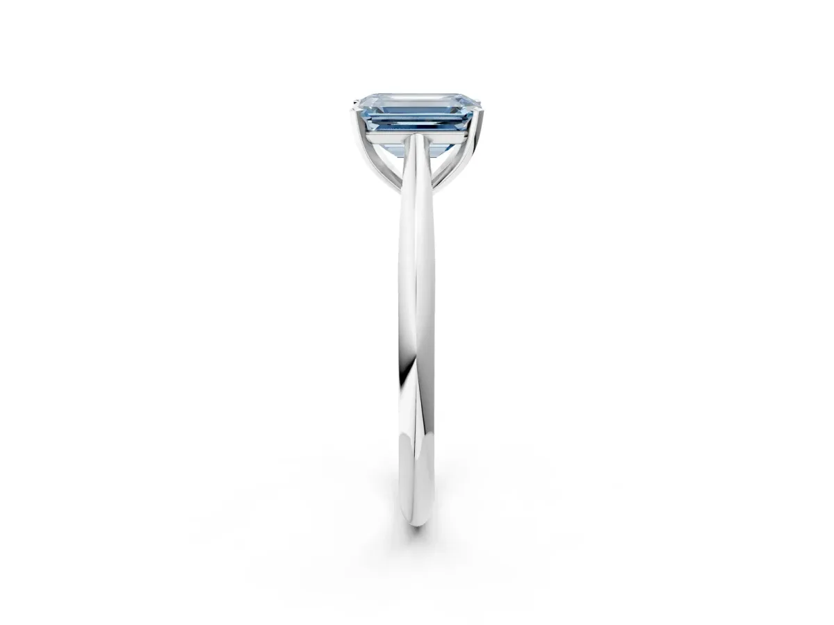Fancy Blue Emerald Cut Diamond Solitaire Engagement Ring with Cathedral Setting and Four-Prong Mount White gold