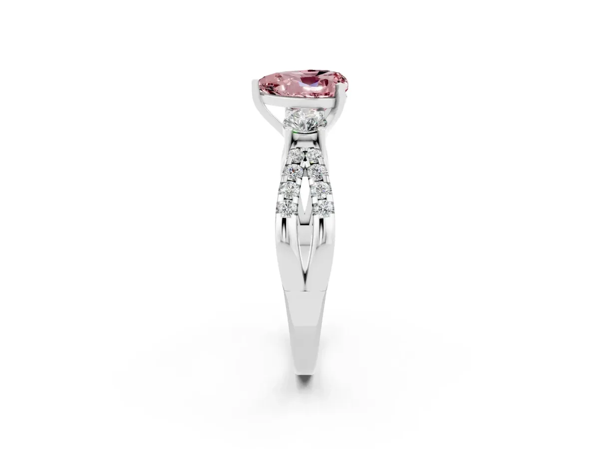 Heart Cut Morganite Three-Stone Ring with Pavé Split Shank and Four-Prong Setting White gold