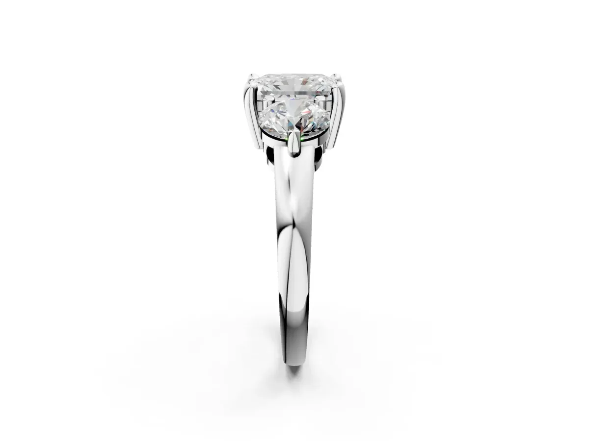 Three-Stone Radiant Cut Brilliant Cut Solitaire Ring with Prong Setting on a Classic Band Platinum
