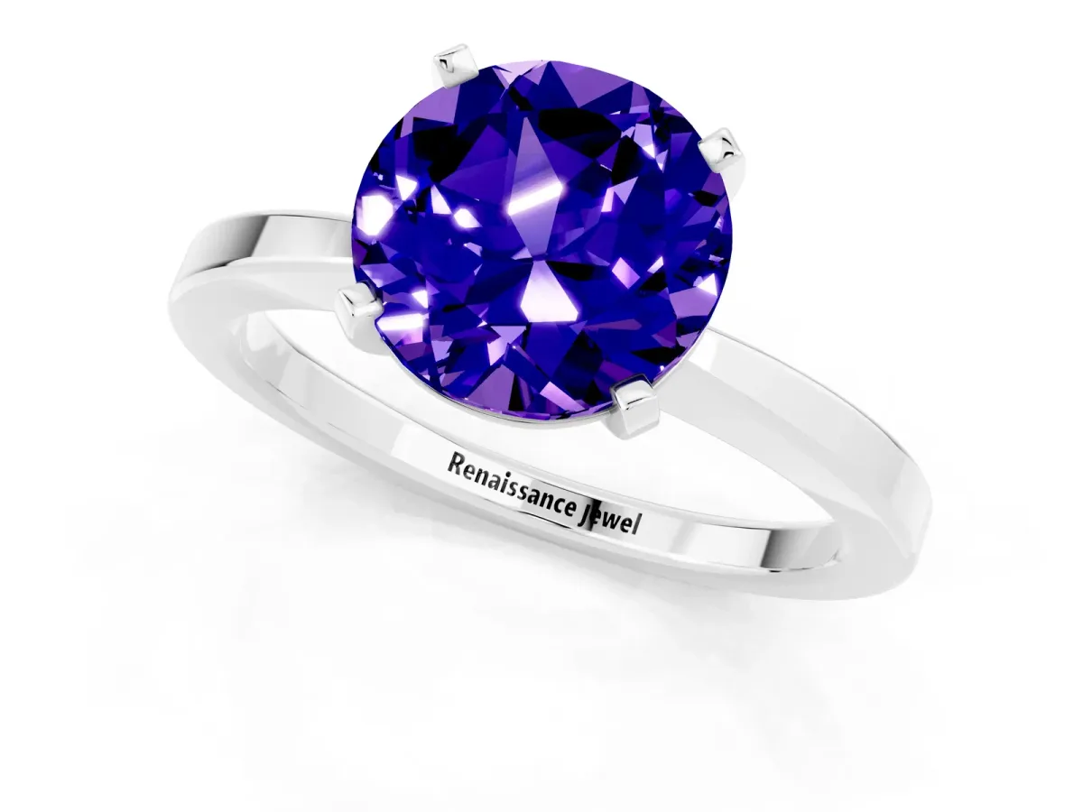 Round Cut Tanzanite Solitaire Engagement Ring with Classic Band and Four-Prong Setting Silver