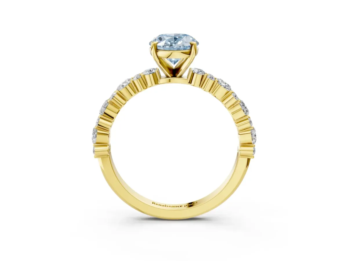Fancy Blue Oval Cut Diamond Side Stone Solitaire Ring with Round and Four-Prong Setting Yellow gold