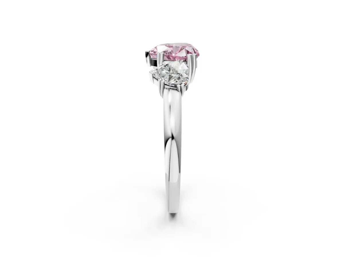 Fancy Pink Three-Stone Heart Cut Cut Diamond Ring with Channel Set Band and Four-Prong Setting Silver