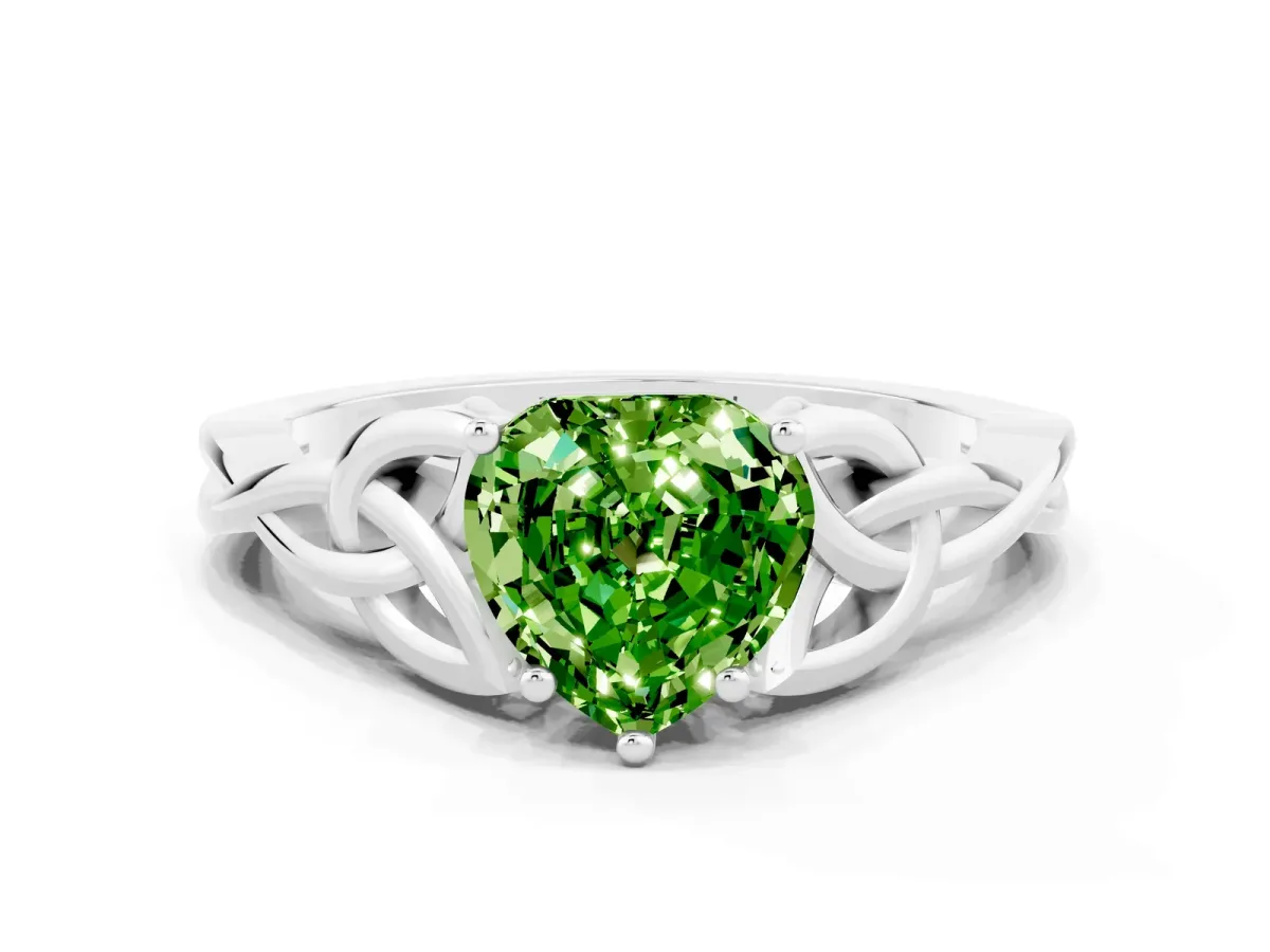 Heart Cut Peridot Solitaire Engagement Ring with Celtic Knot Band and Four-Prong Setting Silver