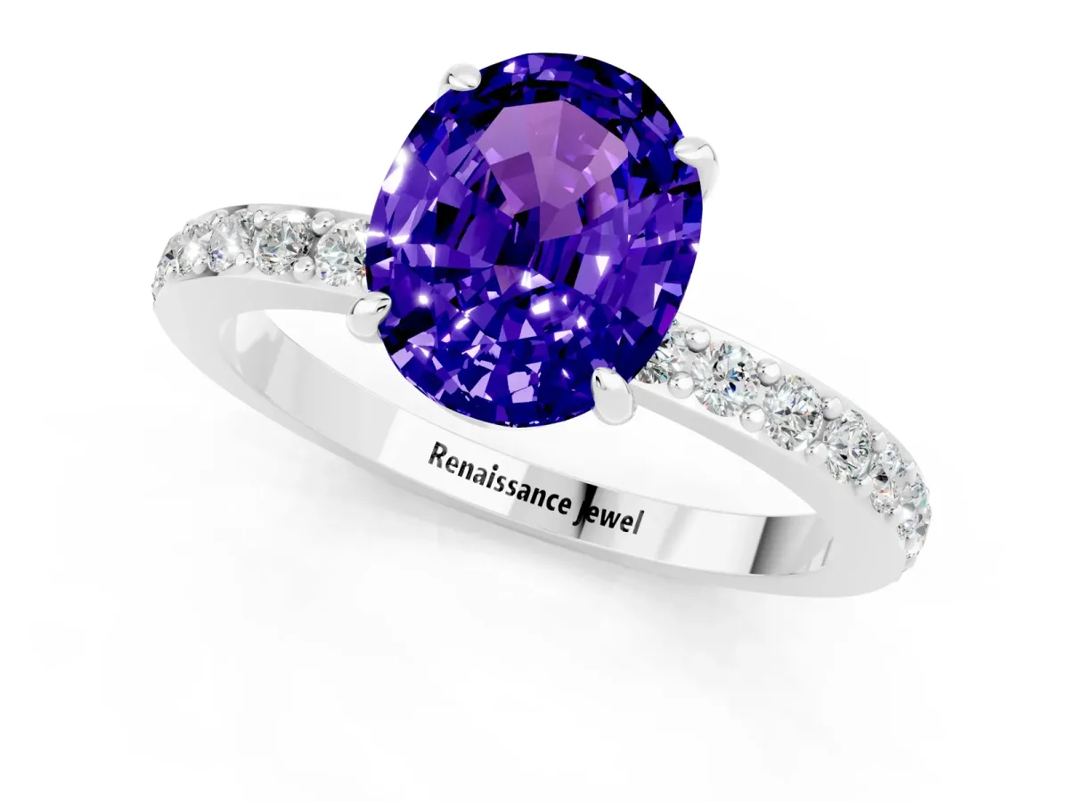 Oval Cut Tanzanite Solitaire Engagement Ring with Pavé Band and Four-Prong Setting Silver
