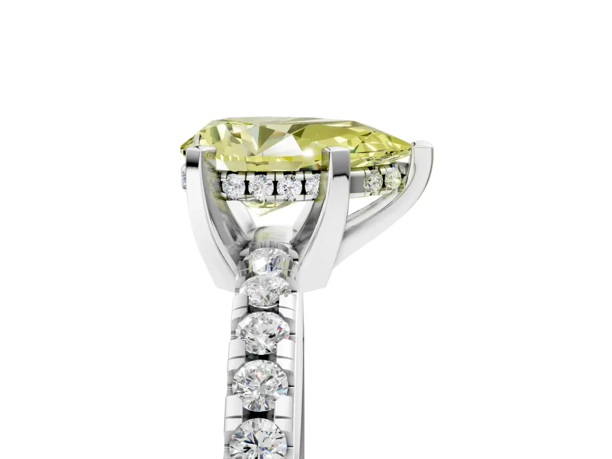 Fancy Yellow Pear Cut Diamond Solitaire Ring with Round Pavé Band and Four-Prong Setting Silver