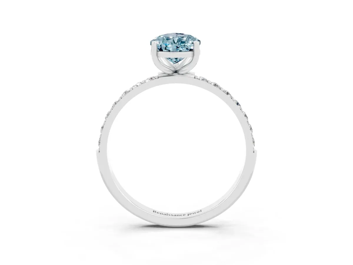 Pear Cut Aquamarine Solitaire Ring with Round Pavé Band and Prong Setting Silver