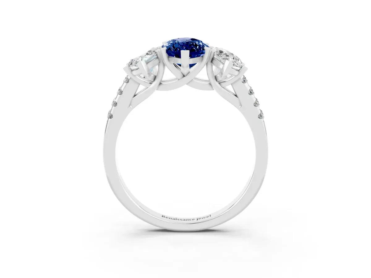 Three-Stone Marquise Cut Blue Sapphire Ring with Round Pavé Band and Prong Setting Silver