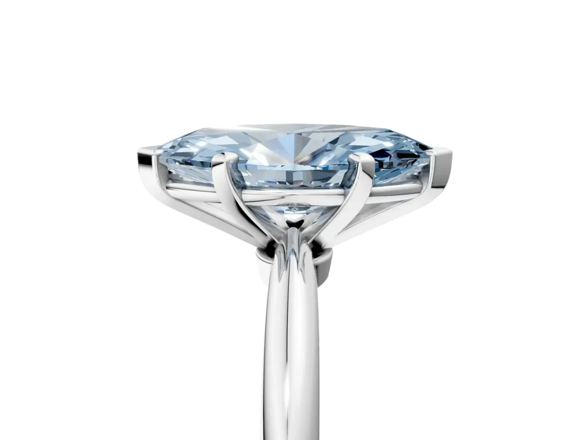 Fancy Blue Marquise Cut Diamond Solitaire Ring with Six-Prong Setting and Classic Band Silver