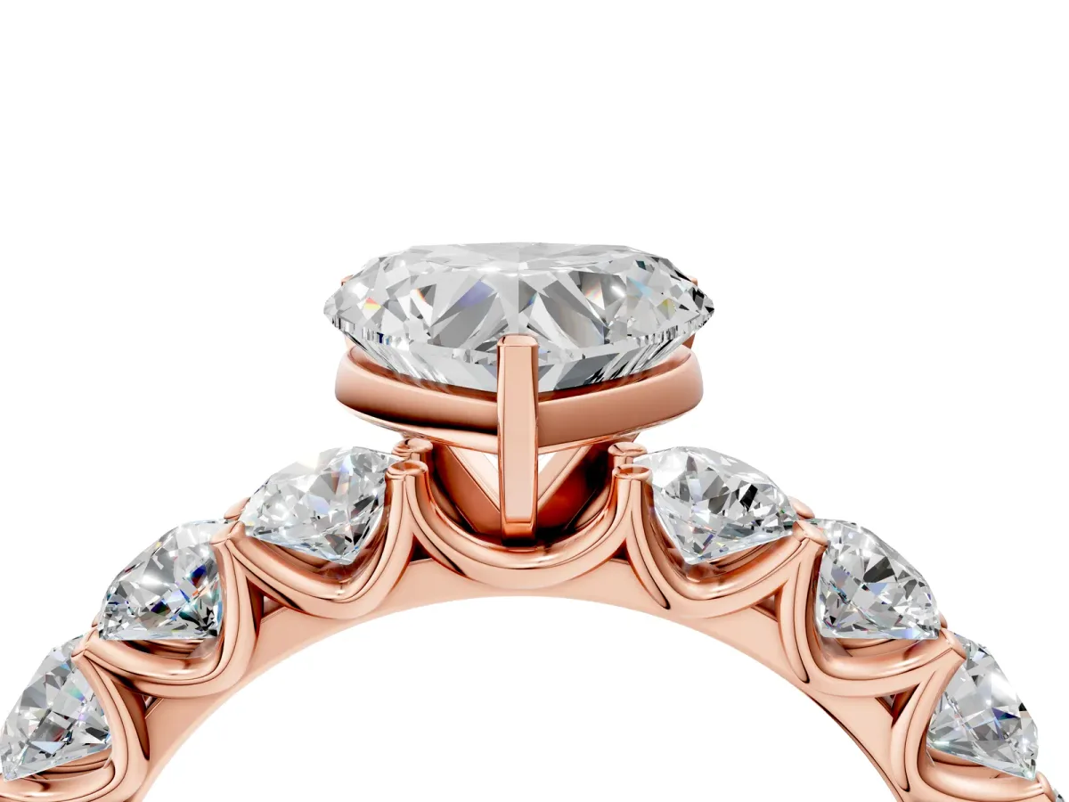 Heart Cut Diamond Prong Setting with Side Stones on a Pave Band Rose gold