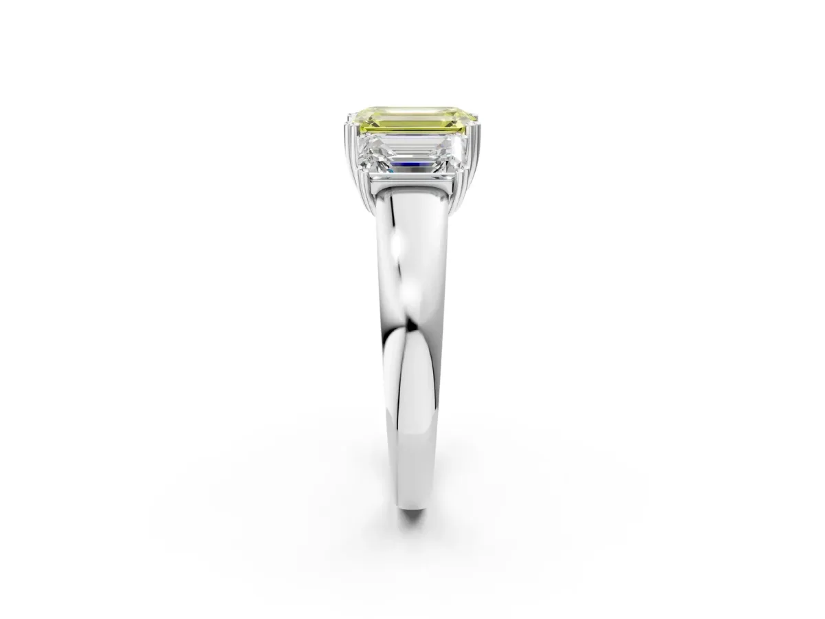 Fancy Yellow Three-Stone Emerald Cut Cut Diamond Ring with Channel Set Band and Four-Prong Setting Silver