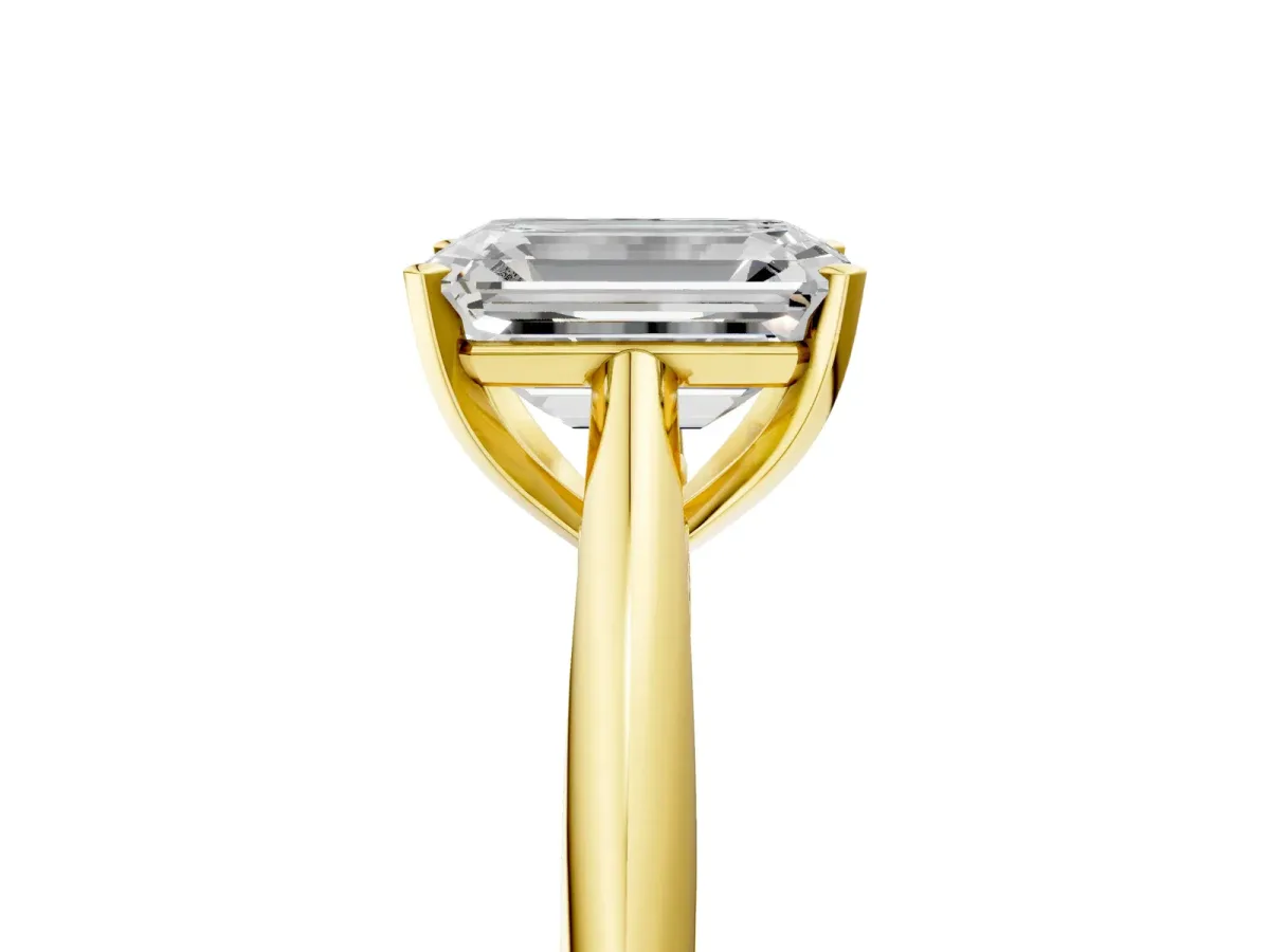 Emerald Cut Diamond Solitaire Engagement Ring with Cathedral Setting and Four-Prong Mount Yellow gold