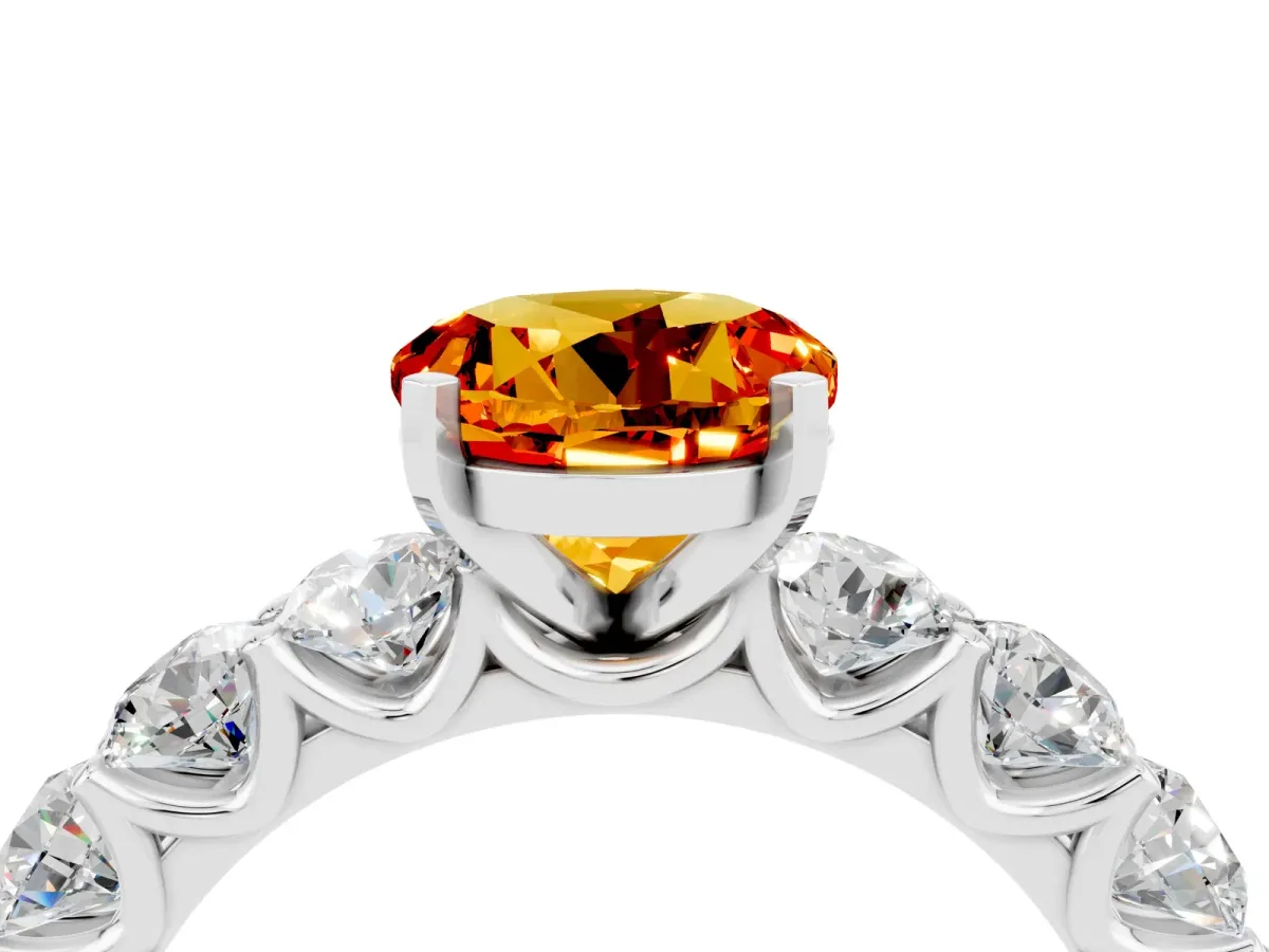 Round Cut Citrine Prong Setting with Side Stones on a Pave Band Silver