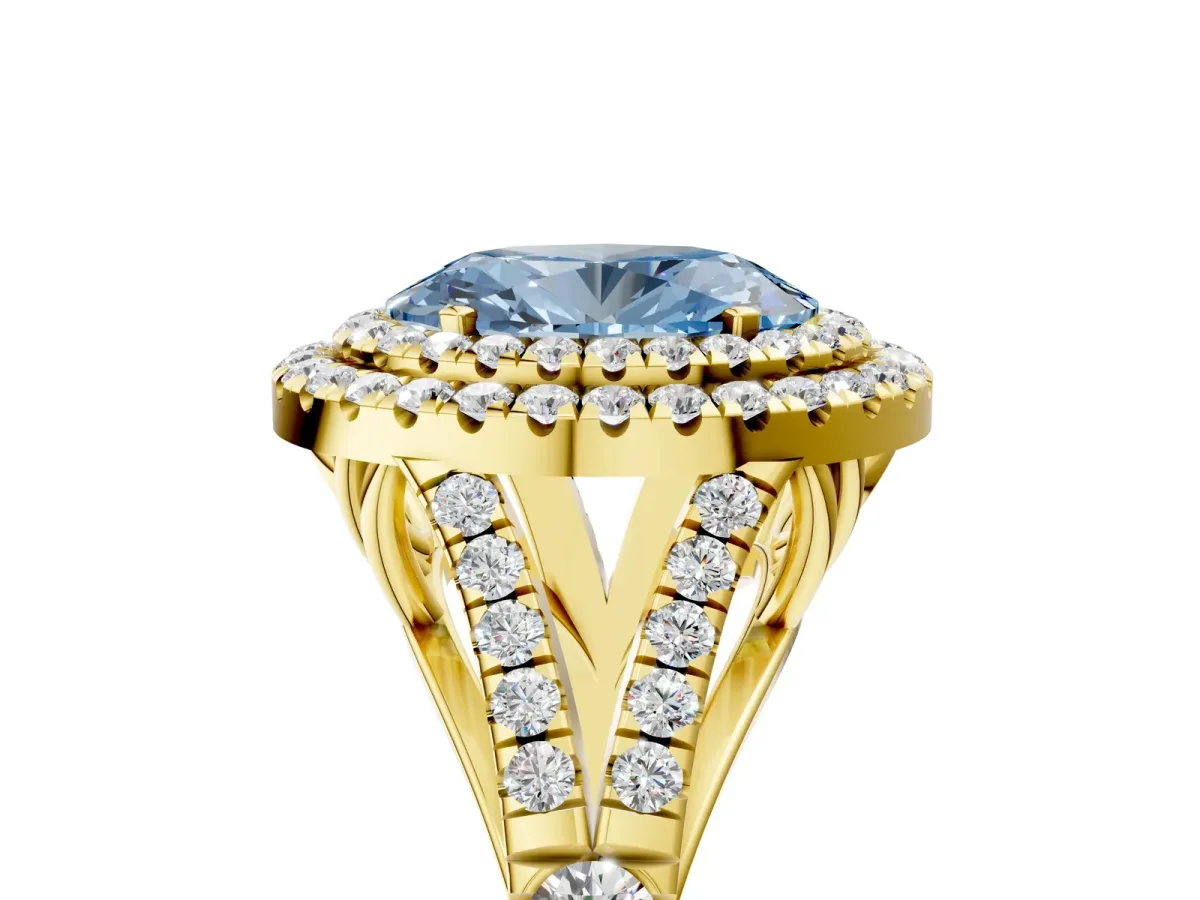 Fancy Blue Double Halo Oval Cut Diamond Split Shank Engagement Ring with Four-Prong Setting Yellow gold