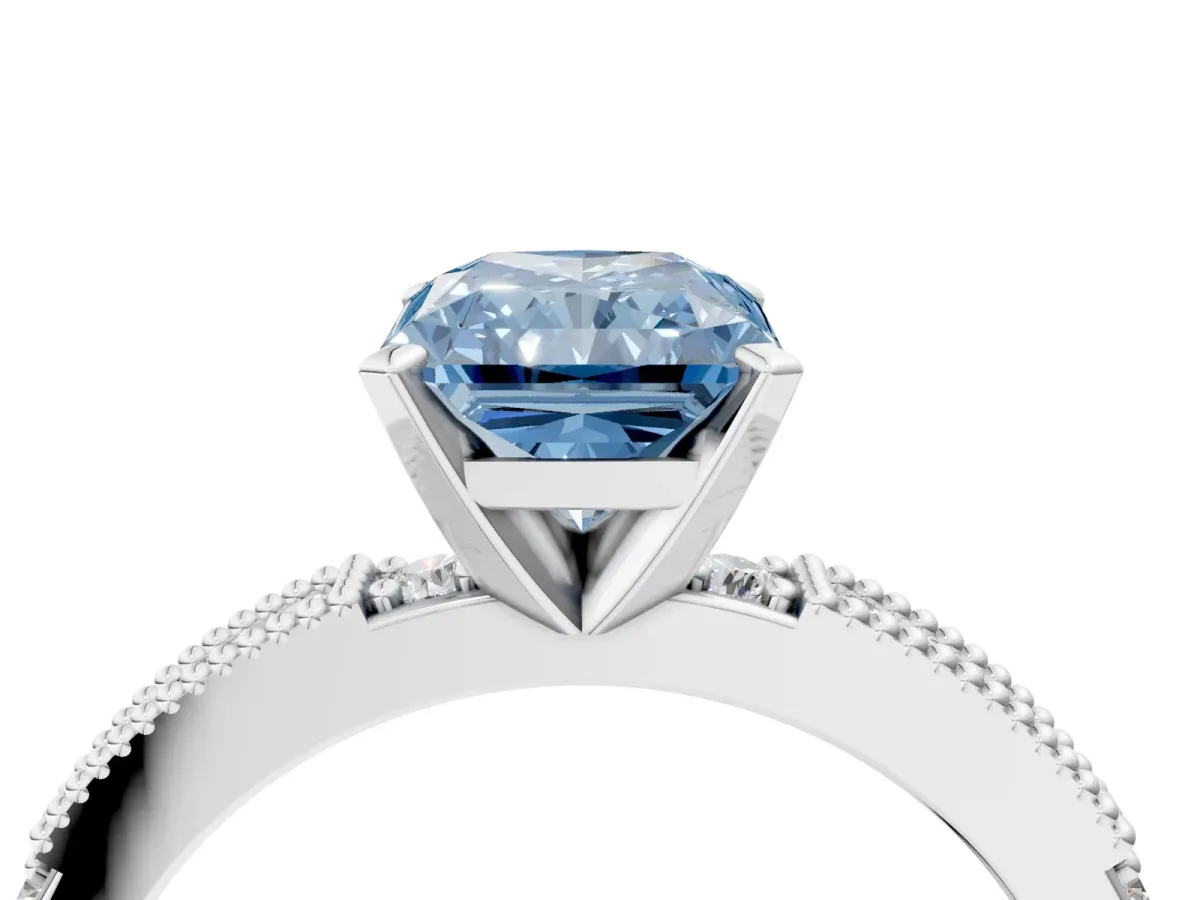 Fancy Blue Radiant Cut Solitaire with Pavé Band and Four-Prong Setting Silver