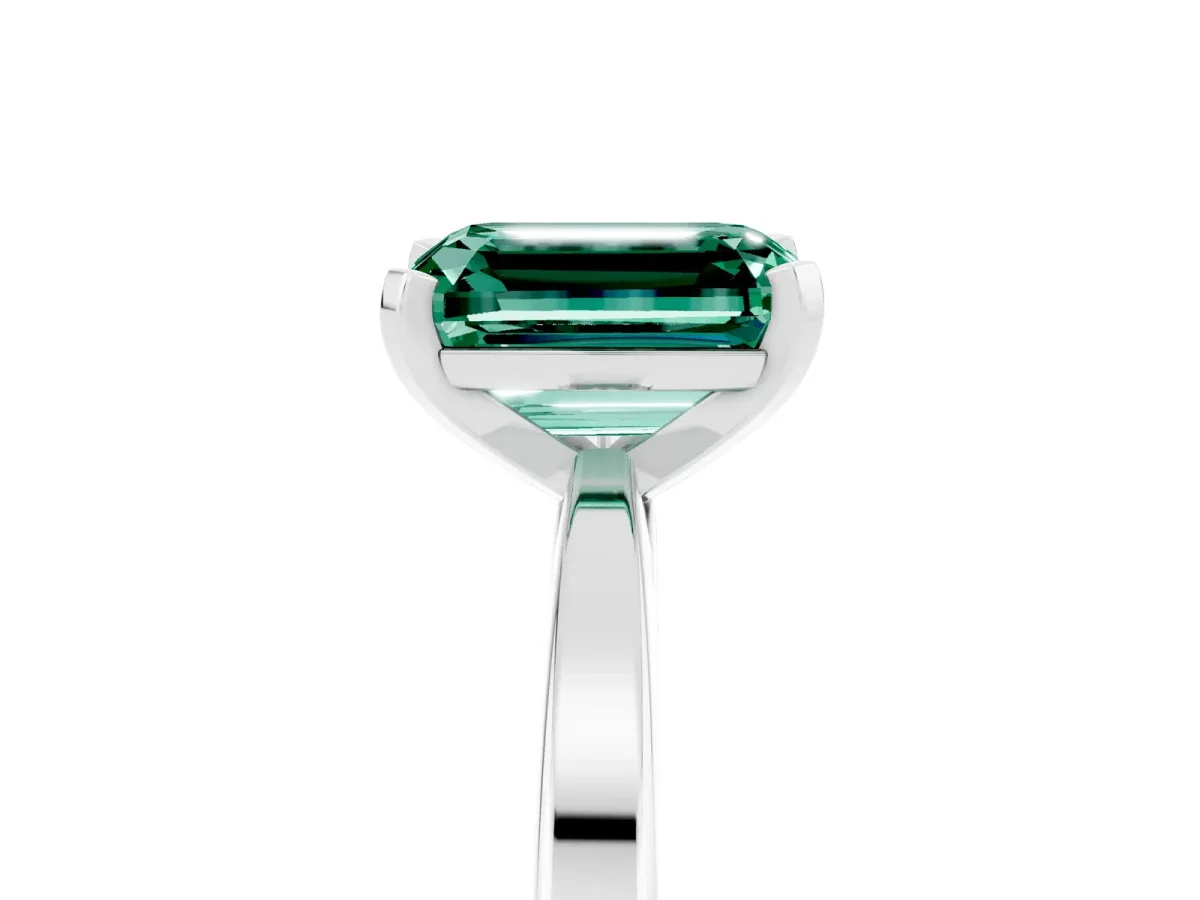 Emerald Cut Green Sapphire Solitaire Engagement Ring with Classic Band and Four-Prong Setting Silver