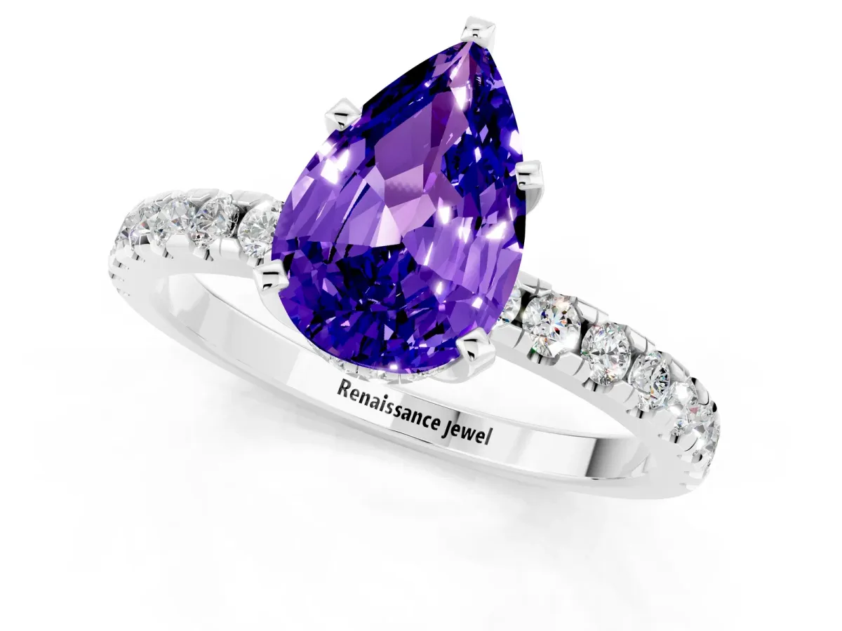 Pear Cut Tanzanite Solitaire Ring with Round Pavé Band and Four-Prong Setting Silver